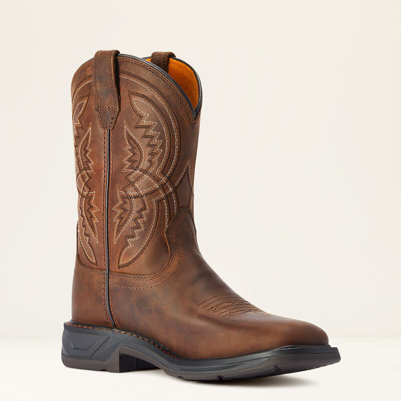 Brown cowboy boot with intricate stitching on a light beige background