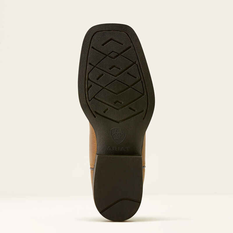 Close-up of a shoe sole with a brand logo on a light beige background