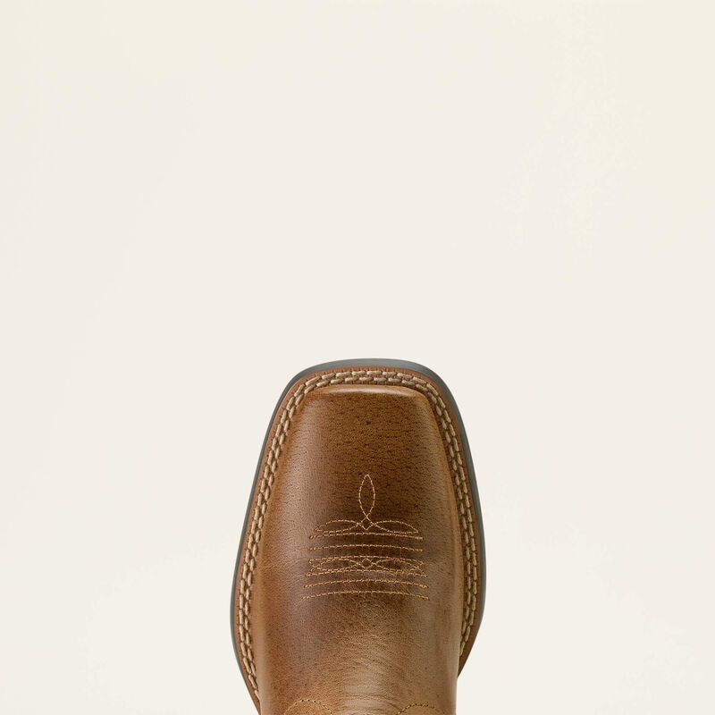 Brown leather boot sole with stitching detail on a beige background