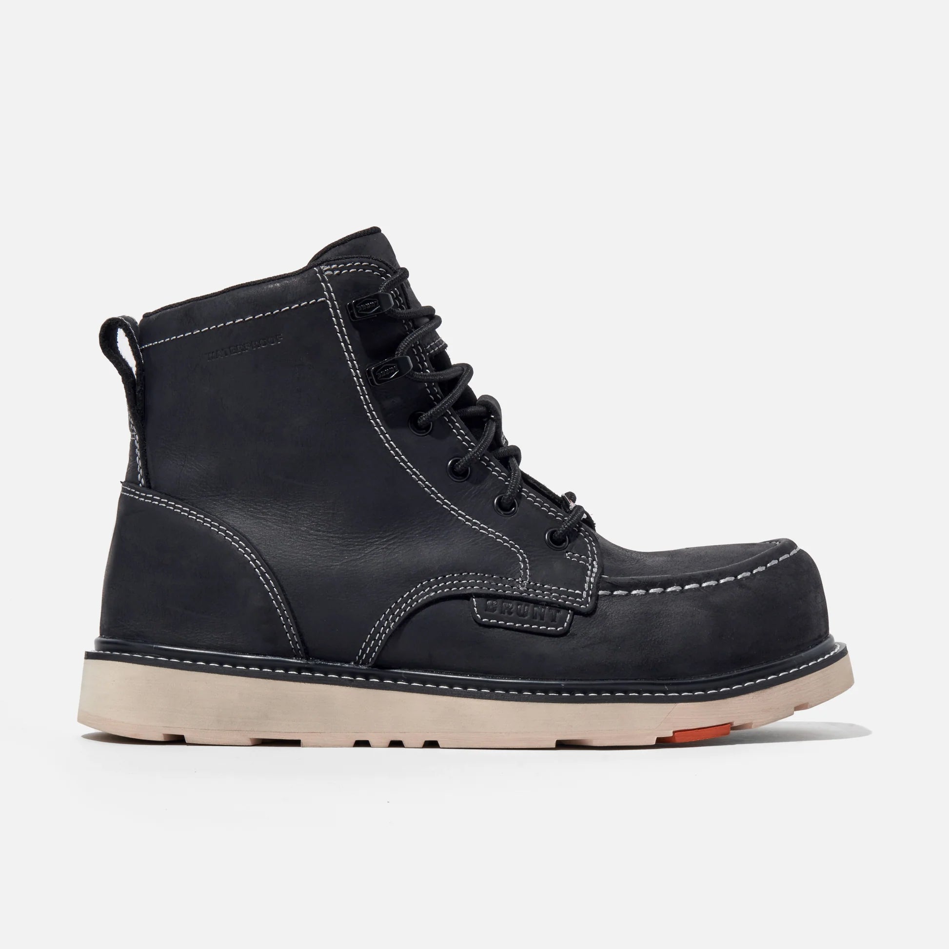 Black leather boot with beige sole on a white background