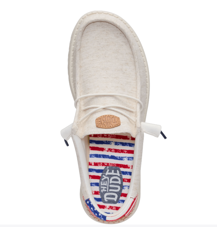 white hey dudes with USA themed soles