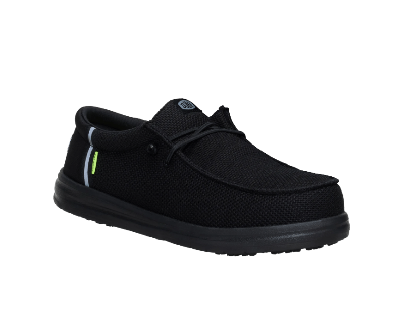 Black slip-on shoe with a green accent on a white background