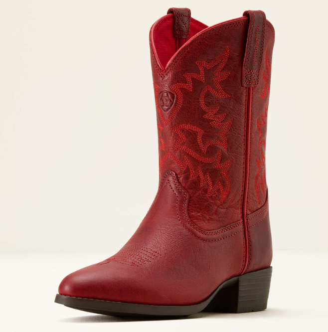 A single red leather cowboy boot with western embroidery and a black block heel, photographed against a plain off-white background.
