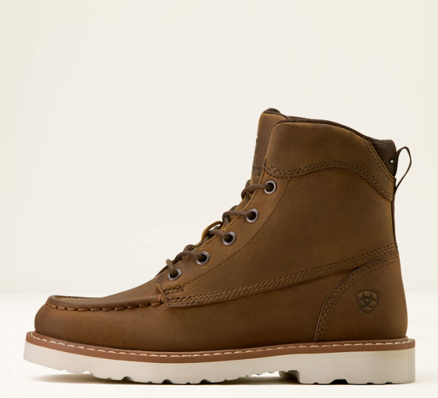 A brown suede lace-up ankle boot with a thick white sole, shown in a side profile view against a plain off-white background.