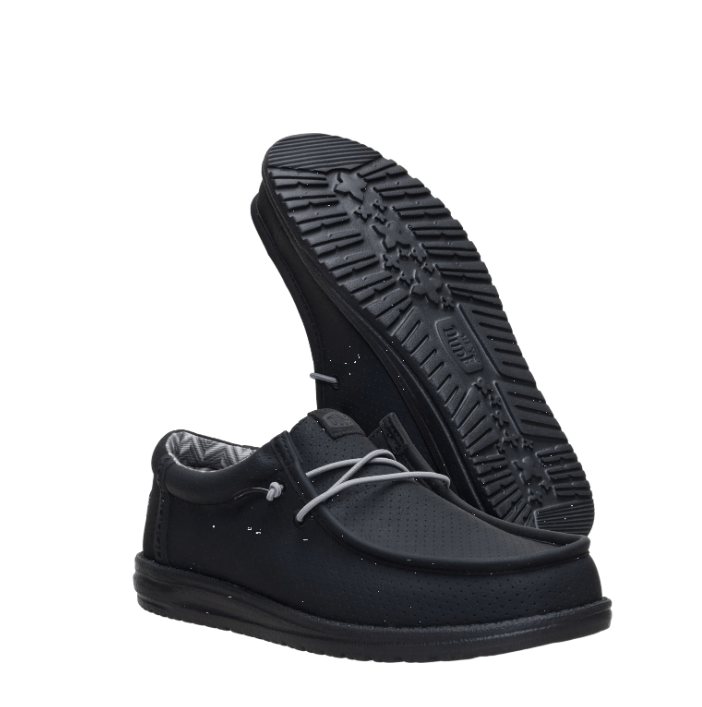 Black shoes with a white sole on a white background
