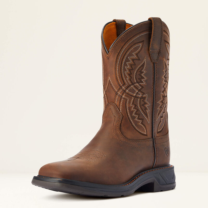 Brown leather boot with intricate stitching on a beige background