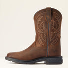 Brown cowboy boot with intricate stitching on a beige background