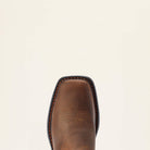 Close-up of a brown leather boot with stitching detail on a beige background