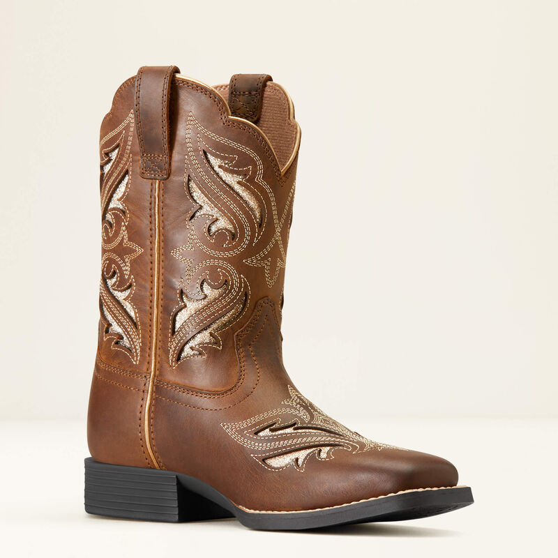 Brown cowboy boot with intricate designs on a beige background