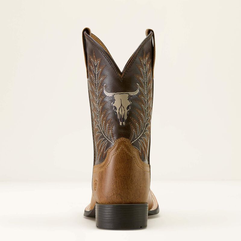 Brown cowboy boot with decorative design on a white background