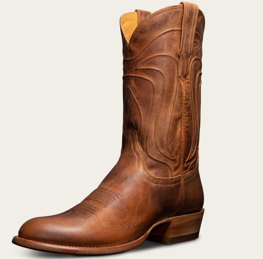 A single brown leather cowboy boot with decorative stitching, a square toe, and a low stacked heel, shown on a plain light background.