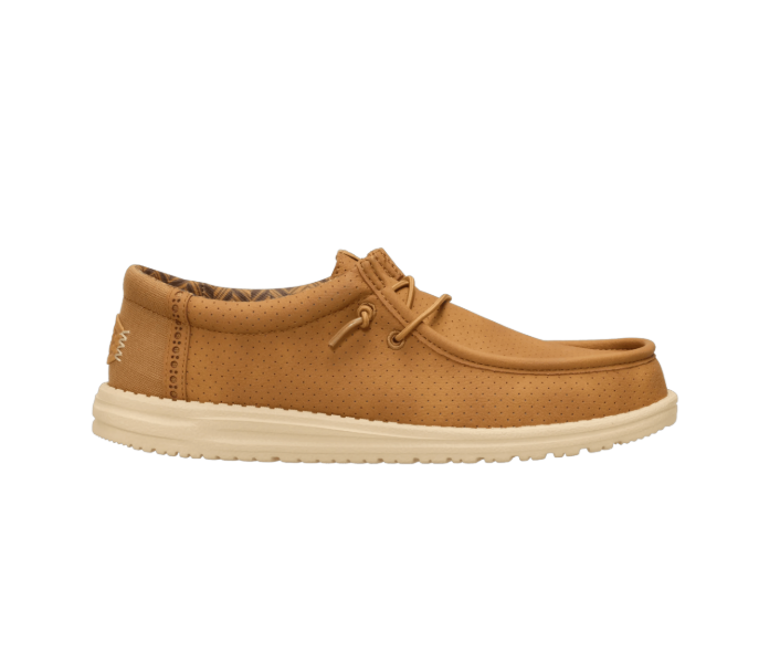 Brown shoe with white sole on a white background