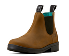A single brown leather Chelsea boot with black elastic side panels and a black sole, shown from a three-quarter angle on a white background. The brand Timberland is visible on the pull tabs and side logo.