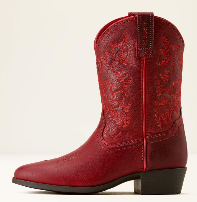 A single red leather cowboy boot with decorative red embroidery on the shaft, shown in a side profile against a light beige background.