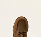 A close-up top-down view of a brown leather lace-up shoe against a solid off-white background.