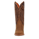 A single brown leather cowboy boot shown from the back against a dark blue background, with decorative stitching on the shaft and a Dan Post logo watermark in the lower-left corner.