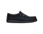 Brown leather loafer shoe on a light gray background