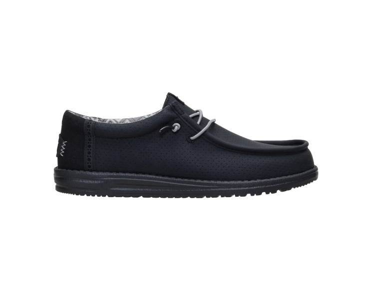 Brown leather loafer shoe on a light gray background