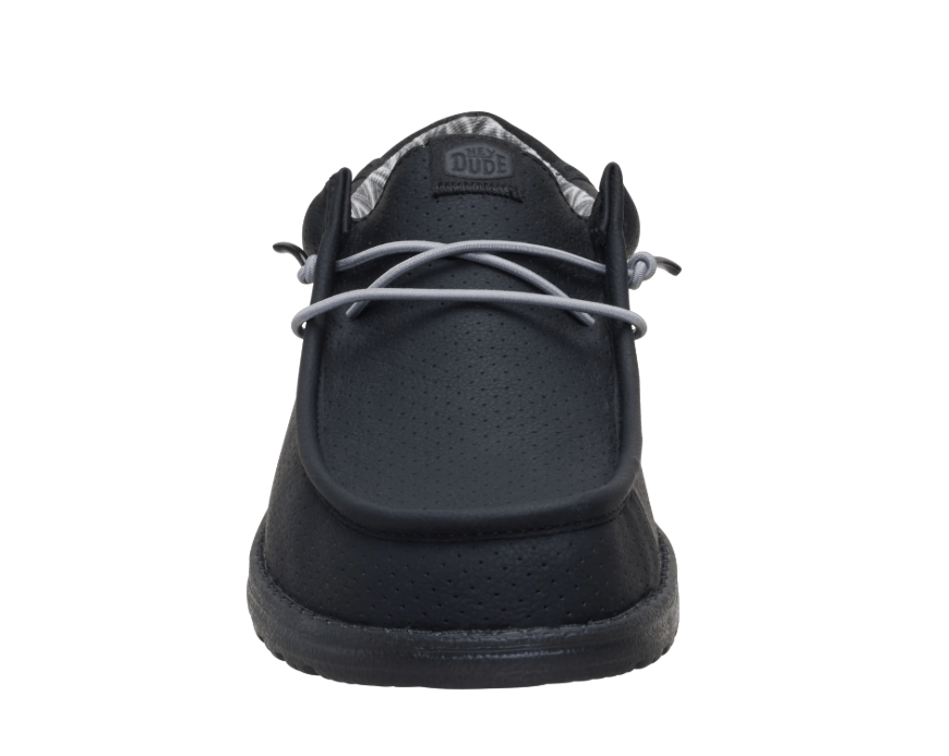 Black shoe with gray laces on a white background