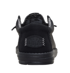 Black sneaker with 'Hey Dude' branding on a white background