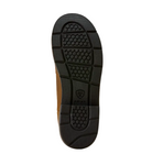 The black rubber outsole of a shoe, showing the tread pattern and embossed Ariat logo, photographed from the bottom against a light cream background.