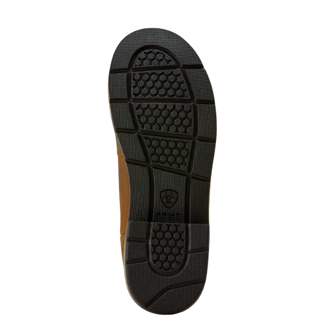 The black rubber outsole of a shoe, showing the tread pattern and embossed Ariat logo, photographed from the bottom against a light cream background.